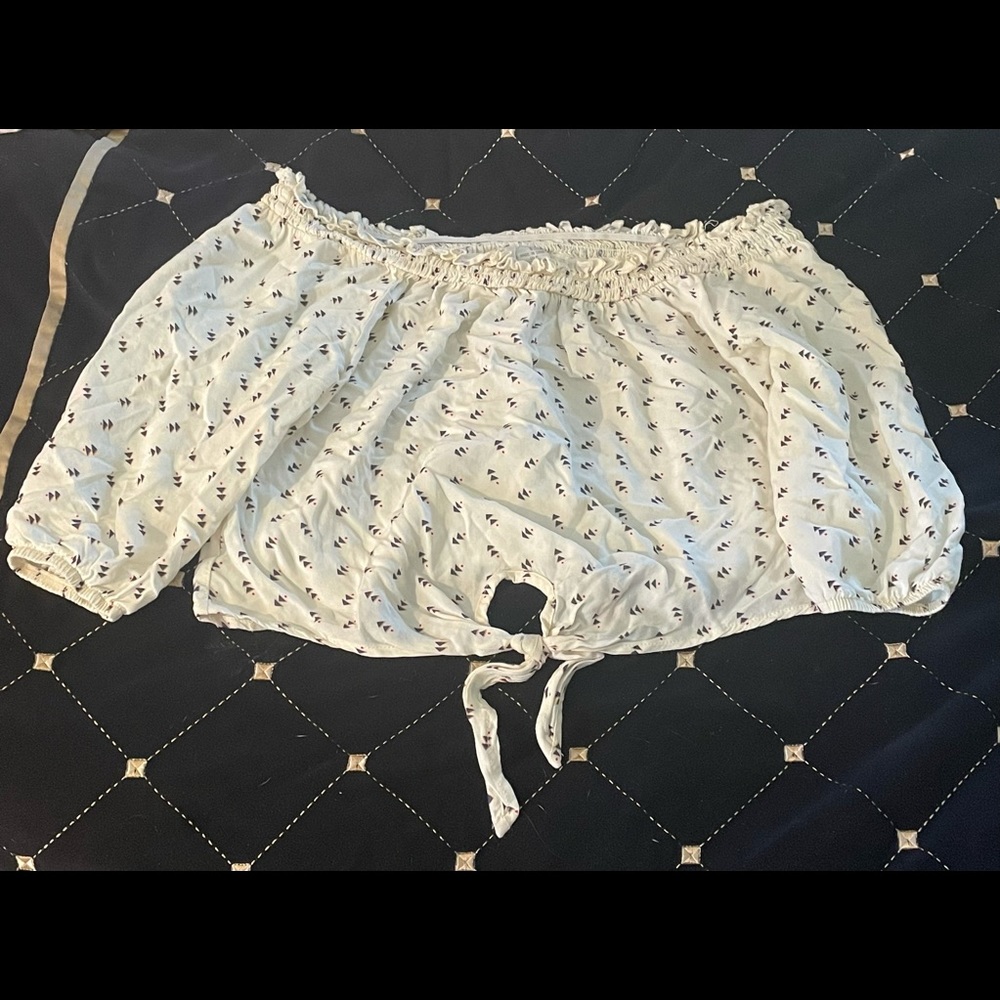 I am selling this cute shirt. The brand is called Mimi Chica.